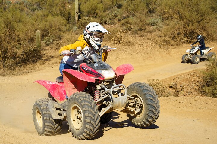 Navigate Nevada's diverse terrains on a self-guided ATV adventure from rocky trails to soft sand dunes offering a unique exploration experience in the heart of the desert.